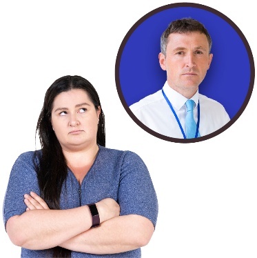 Person with crossed arms and angry expression looking up at a person inside a circular frame.