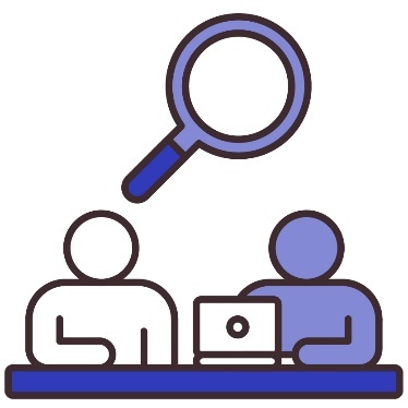 A magnifying glass above 2 people at a desk with a laptop.